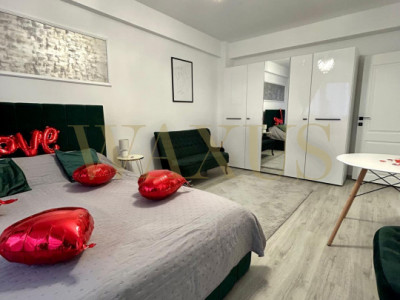 Apartament de vanzare o camera decomandata , zona Terra , Floresti
